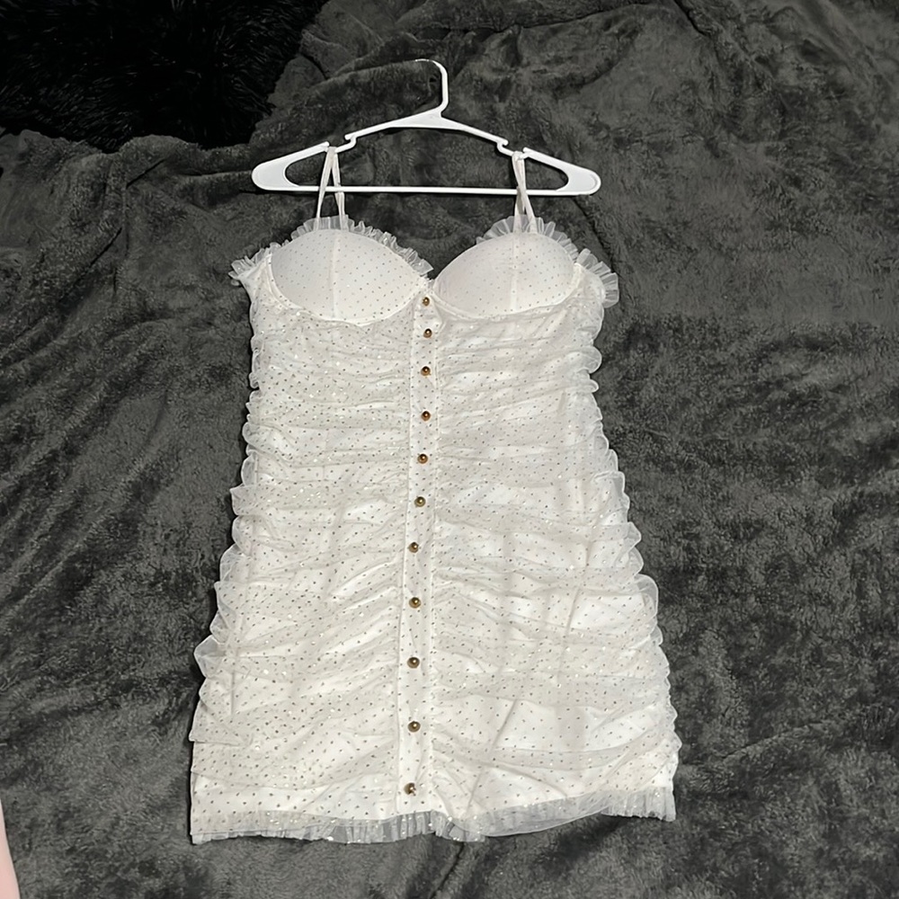 large white dress with gold sparkles fingertip length